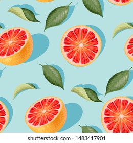 Seamless pattern with grapefruit slices and leaves