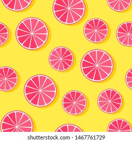 Seamless pattern with grapefruits. Tropical summer background. Vector illustration.