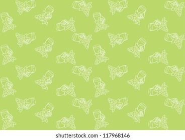 Seamless pattern with grapes on a green background