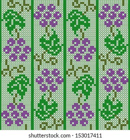 Seamless pattern with grapes on a green background. Imitation embroidery 