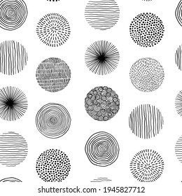 Seamless pattern of graphic doodle black and white circles. Hand Drawn Scribble Circle shapes. Trendy hand drawn textures. Modern abstract design for paper, cover, fabric, interior decor