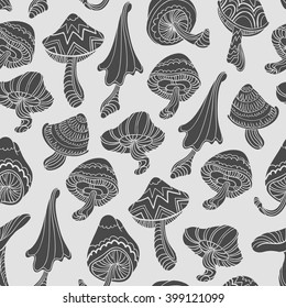 Seamless pattern with gray mushrooms silhouettes. Simple background. Vector illustration.