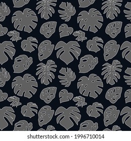 Seamless pattern with gray tropical leaves on black background. Monstera leaves silhouette pattern.