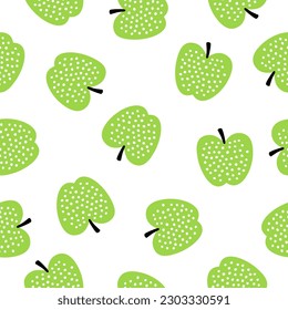 Seamless pattern with green apples with white dots