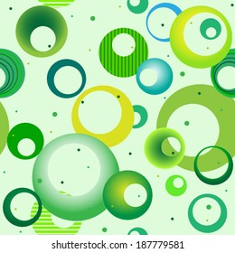 Seamless pattern green background with a variety of rings. Copy that square to the side,you'll get seamlessly tiling pattern which gives the resulting image. Endless texture for printing onto fabric.