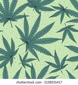Patrón sin foco con hojas de cannabis verdes sobre fondo verde.