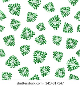 Seamless pattern of green chaotic stylized leaves on white background