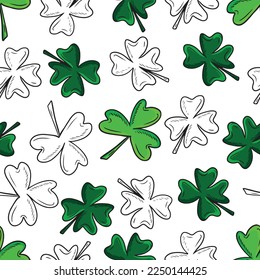 Seamless pattern with green clover isolated on white background. Hand drawn vector silhouette sketch illustration in doodle engraved vintage outline style. St. Patrick's day, lucky, botanical, plant