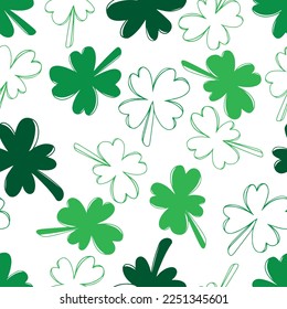 Seamless pattern with green clover isolated on white background. Hand drawn vector silhouette sketch illustration in doodle engraved vintage outline style. St. Patrick's day, lucky, botanical, plant