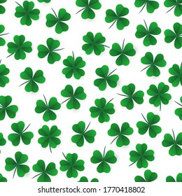 Seamless pattern with green clover leaves. Paper cut multilayer design. Modern background with repeating elements for packaging, printing, fabric. Vector. Vector illustration