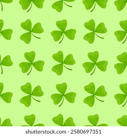 Seamless pattern of green clover shamrocks on light green background for St. Patrick's Day