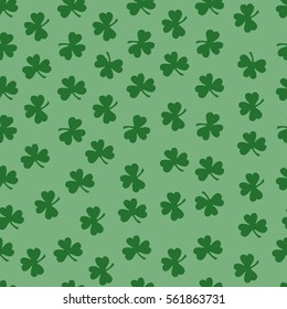 Seamless pattern with green clover silhouette. Nature background. Hand drawn vector illustration. St. Patrick's Day. Wrapping paper.