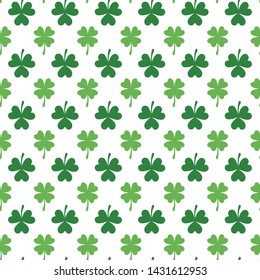 Seamless pattern with green clovers