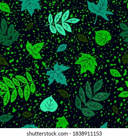 Seamless pattern with green different leaves on a black background. Spring composition. Vector image.                     