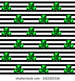 Seamless pattern with green emerald clover and black stripes on white. St. Patrick's Day wallpaper