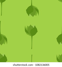 Seamless pattern from green flowers on a green background