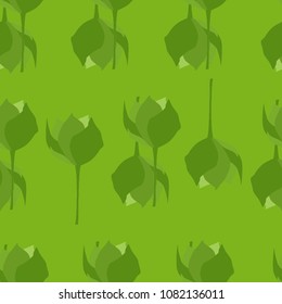 Seamless pattern from green flowers on a green background