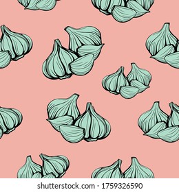 seamless pattern of green garlic on a pink background.Bright pattern of garlic.Hand-drawn vector fashion illustration. Head of garlic