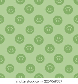 Seamless pattern with green happy faces