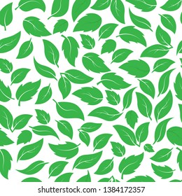 Seamless pattern of green leaves of different plants. Ideal for textiles, packaging, paper printing, simple backgrounds and textures.