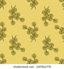 Seamless Pattern with Green Leaves on a Yellow Background