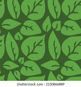seamless pattern with green leaves. green leaves on the green background