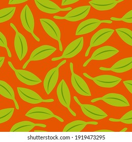 Seamless pattern with green leaves. Orange background. Autumn, spring or summer. Nature and ecology. For packaging design and wrapping paper. For wallpaper, scrapbooking, textile and post cards