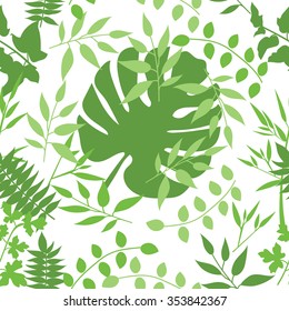 Seamless pattern green leaves of palm tree. Vector background.