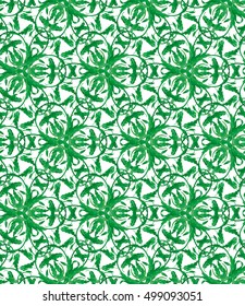 Seamless pattern with green leaves of trees on a white background. It can be use for web site design. Vector illustration