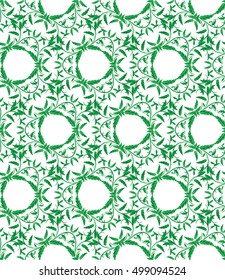 Seamless pattern with green leaves of trees on a white background. It can be use for web site design. Vector illustration