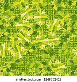 Seamless pattern. Green maple leaves on abstract texture background.