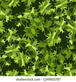 Seamless pattern. Green maple leaves. Camouflage style.