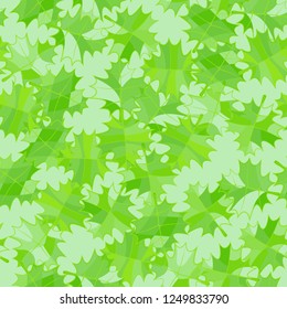 Seamless pattern. Green maple leaves. Camouflage style.