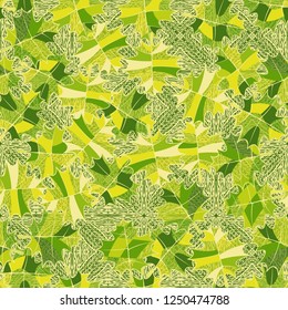Seamless pattern. Green maple leaves on the background of the parquet pattern. Camouflage style.