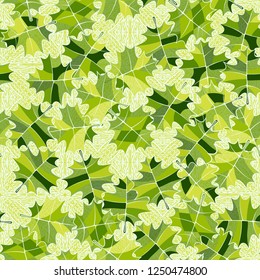 Seamless pattern. Green maple leaves on the background of the parquet pattern. Camouflage style.