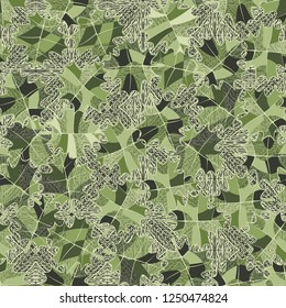 Seamless pattern. Green maple leaves on the background of the parquet pattern. Camouflage style.