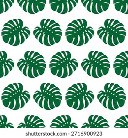 Seamless pattern with green monstera leaves on white background.