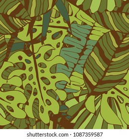 Seamless pattern with green palm leaves. Floral background. Nature print. Fabric design