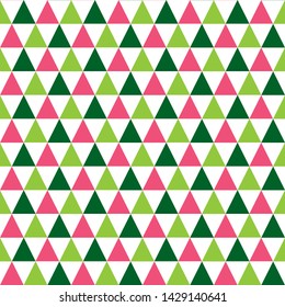 Seamless pattern with green and pink triangles