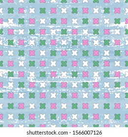 Seamless pattern. Green, pink and white crosses, blue-steel with white background, imitation of a rough painted surface. Great for decorating fabrics, gift wrapping, printed materials, advertising.