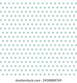 Seamless pattern with green polka dots on light blue background