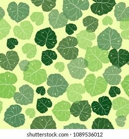 Seamless pattern with green round leaves. Vector illustration.