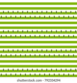Seamless pattern with green seeds on the striped background. Vector.