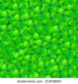 seamless pattern of green shamrock, trefoil or clover leaf on green background. irish symbol for patrick day celebration.