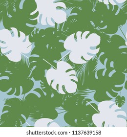 Seamless pattern with with green tropical leaves. (Monstéra). An exotic texture. 