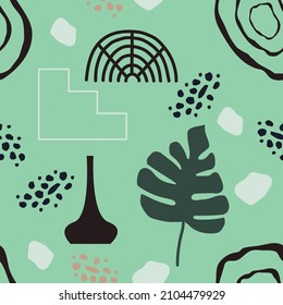 Seamless pattern with green tropical leaves and shapes