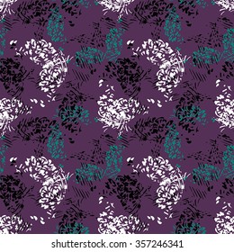 Seamless pattern with green, white and black elements on lilac background