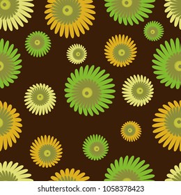 Seamless pattern from green and yellow abstract flowers on a brown background