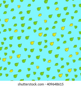 Seamless pattern of green and yellow leaves on a blue background
