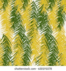 Seamless pattern of green and yellow palm leaves. Light background. Vector.